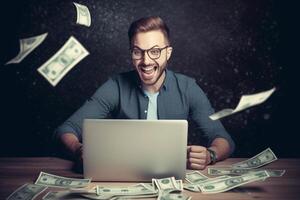 Excited young businessman sitting at his desk with lots of money flying around him photo