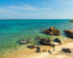 Landscape summer frontview panorama tropical seabeach rock blue sky white sand background calm Nature ocean Beautiful wave crash splashing water travel Khao Leam Ya National Park East thailand Exotic photo