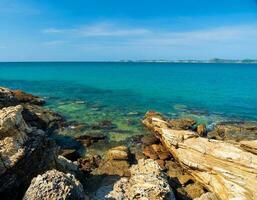 Landscape summer frontview panorama tropical seabeach rock blue sky white sand background calm Nature ocean Beautiful wave crash splashing water travel Khao Leam Ya National Park East thailand Exotic photo