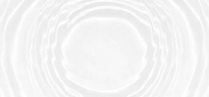 White water with ripples on the surface. Defocus blurred transparent white colored clear calm water surface texture with splashes and bubbles. Water waves with shining pattern texture background. photo