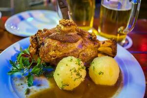 Deep fried pork knuckle  in Frankfurt, German photo