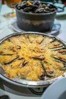 Traditional Belgian steamed mussels, mussels with cheese photo