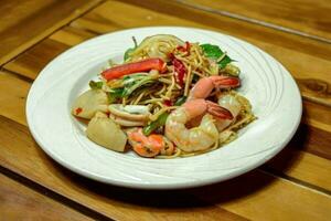 Stir-fried Spaghetti with Seafood, Stir-Fried Pasta with Kra Baow, Stir-Fried Seafood Noodles, Mixed Culture Cuisine photo