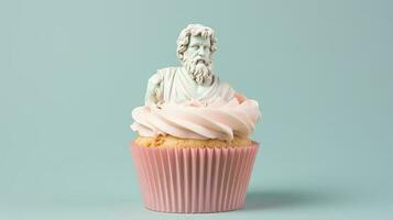 Art sculpture of ancient Italian from marble with a cupcake isolated on a pastel background with a copy space photo