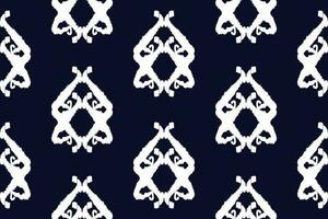 Seamless pattern of Ikat paisley, traditional seamless pattern, black background, Aztec style, embroidery, abstract, vector, design illustration for texture, fabric, print. vector