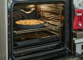 Apricot pie baked in an electric oven. French gourmet cuisine photo