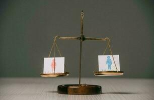 Gender equality concept. Male and female symbol on the scales with balance on blue background. Girl or Boy minimal style, 3d render. photo
