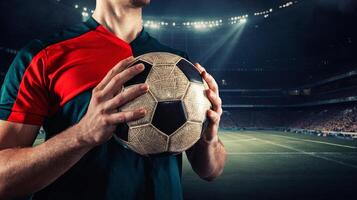 Confident soccer player ready to play holds the ball in his hands at the stadium. Generative AI photo