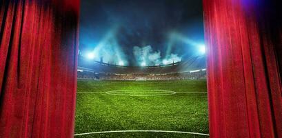 Elegant theater curtains show a soccer stadium ready to the football match photo