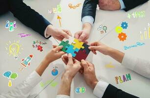 Teamwork of partners connect puzzle pieces as integration and startup photo