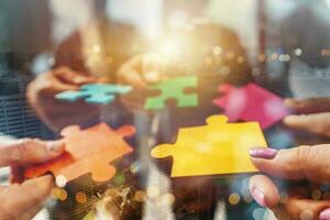 Teamwork of partners connect puzzle pieces as integration and startup photo