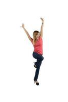 Happy and joyful woman full of energy with arms raised photo