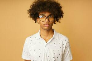 Serious afro man with glasses and piercing photo