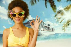 Happy woman in vacation with cruise ship does ok with the hand photo