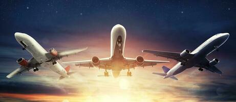 Summer holiday and traveling concept with aircrafts in the sky photo