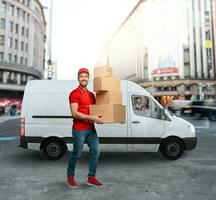 Courier ready to deliver packages with transport truck. photo