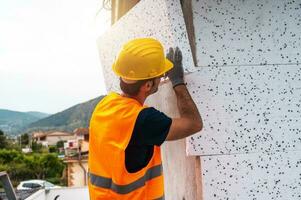 Polystyrene thermal cladding for energy saving on a construction site photo