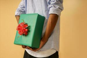 man is ready to give a christmas present photo