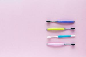 Toothbrush on pink background photo