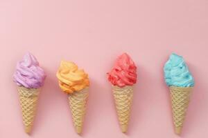 Various of colourful meringue ice cream cone photo