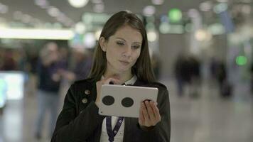 Young Attractive Confident Woman Using Mobile Tablet Screen While Traveling on Business Trip video