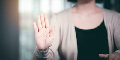 human hand stop sign, warning concept, refusal, caution, symbolic communication, preventing subsequent problems ,Help Prevent Piracy , Stop Violence ,Warning gestures to stop and check safety photo