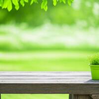 Empty wooden table with blurred green garden background. For product display. AI generated photo