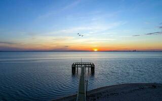 Mobile Bay at sunset in Daphne, AL photo