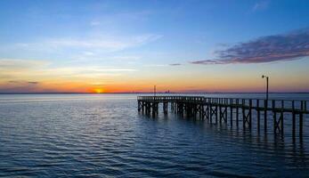 Mobile Bay at sunset in Daphne, AL photo