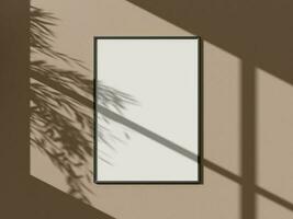Minimal black vertical picture poster frame mockup on wall leaf shadow photo