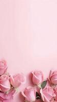 Pink roses on pink background. Flat lay, top view, copy space photo