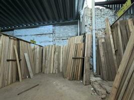 Lumber with vertical boards of tropical wood photo