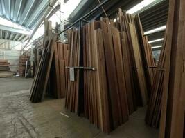 Lumber with vertical boards of tropical wood photo