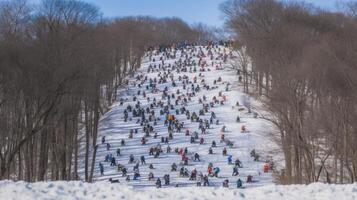 Group of skiers athletes compete going down from ski mountain. AI generated. photo