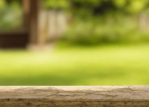 Vintage table top looking out to a defocussed green garden background photo