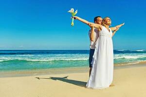 Beautiful, happy newly married couple photo