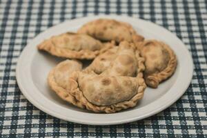 tradicional argentino cocina, empanadas foto