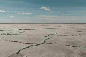 Broken soil in the bed of a salt mine, La Pampa, Argentina photo