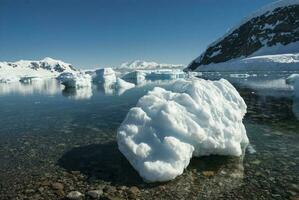 Sea, glacier and mountains landscape in Neko Harbour,Antarctica. photo