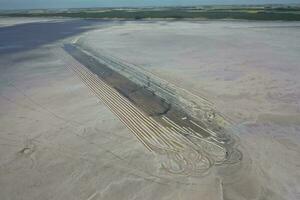 Salt harvest in salt lagoon mine, Salinas Grandes de Hidalgo, La Pampa, Patagonia,  Argentina. photo