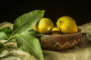 Organic lemons, harvested from the garden, prepared on the table. photo