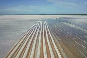 Salt harvest in salt lagoon mine, Salinas Grandes de Hidalgo, La Pampa, Patagonia,  Argentina. photo