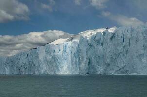 Glacier and clouds in Patagonia, Santa Cruz Province,  Argentina. photo