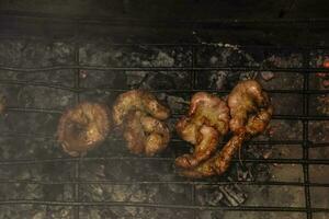 Cow bowels presented on a grill. Argentine Traditional cuisine. photo