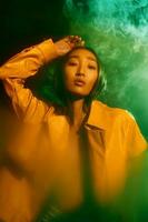 Art woman concept colourful trendy style smoke neon young white light portrait green photo