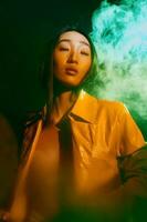 Woman trendy neon concept portrait smoke photo