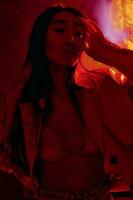 Fashion woman gorgeous art neon portrait trendy colourful red concept caucasian light asian photo