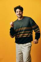 Man portrait background trendy fashion sweater orange photo