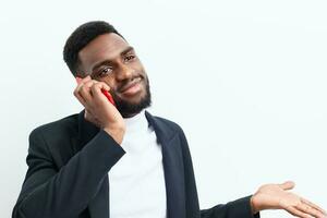 man smile mobile african application young happy black phone businessman technology photo