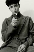 Fashion man cigarette portrait and black smoking white photo